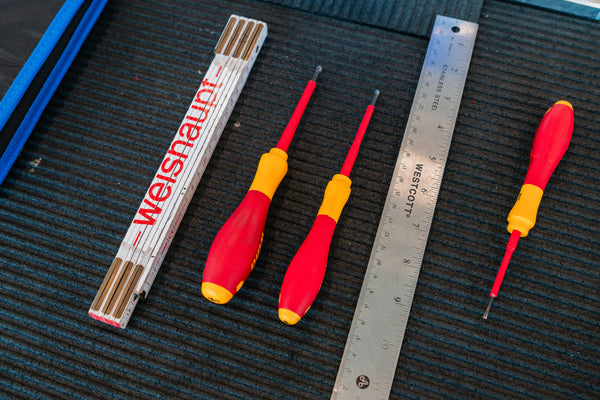 Two red and yellow screwdrivers