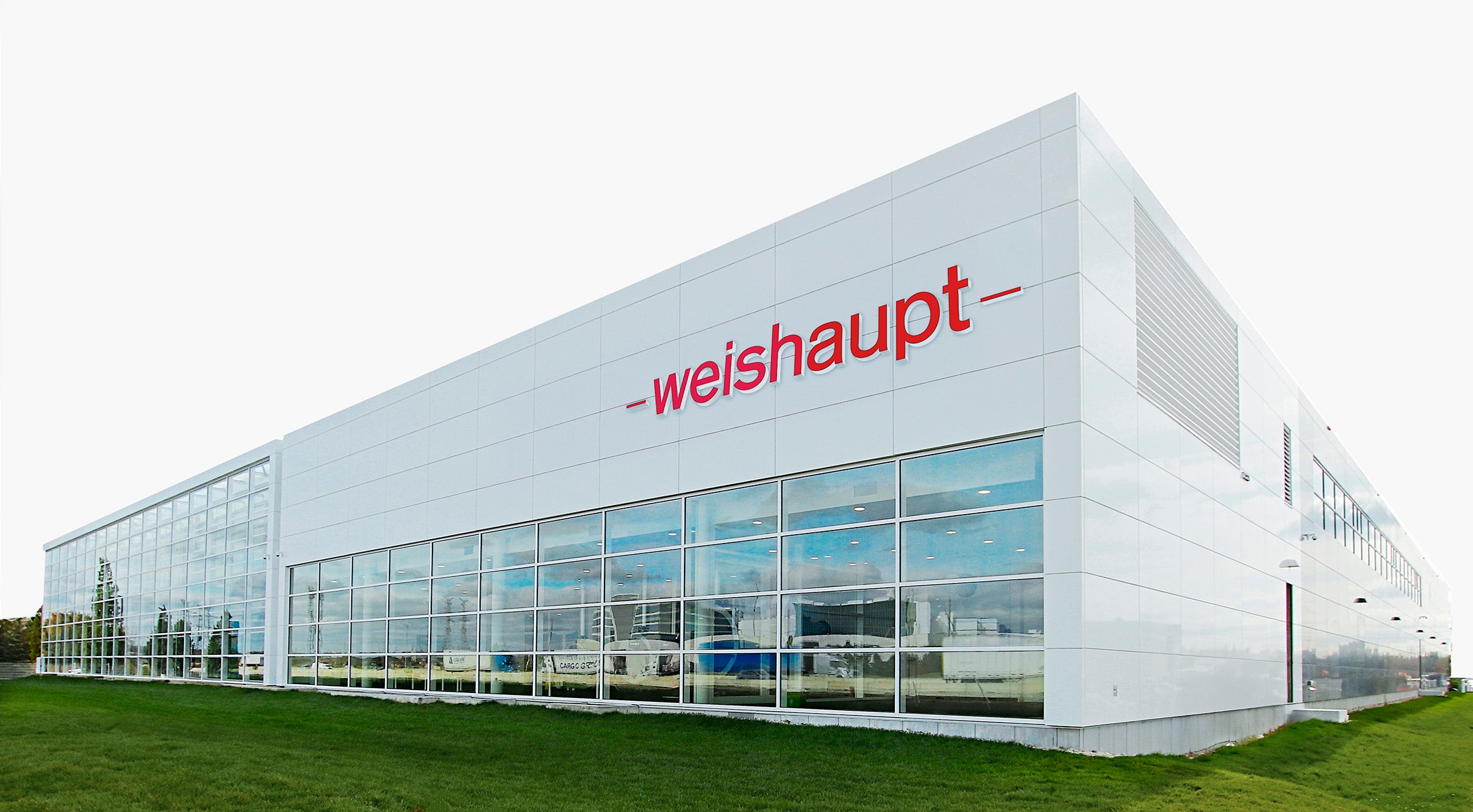 Modern building with 'weishaupt' logo on a white background
